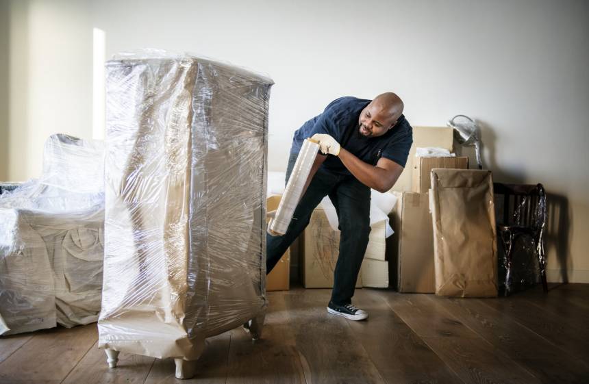 black man moving furniture utc resize