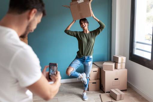 man taking photo with smart phone to his funny utc